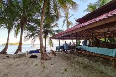 beach hut at water's edge in Panama